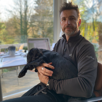 Matt Button with his dog, Badger